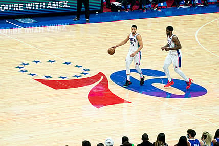 Jun 20, 2021; Philadelphia, Pennsylvania, USA; Philadelphia 76ers center Joel Embiid (21) and guard Ben Simmons (25) in action against the Atlanta Hawks during the second quarter of game seven of the second round of the 2021 NBA Playoffs at Wells Fargo Center. Mandatory Credit: Bill Streicher-USA TODAY Sports