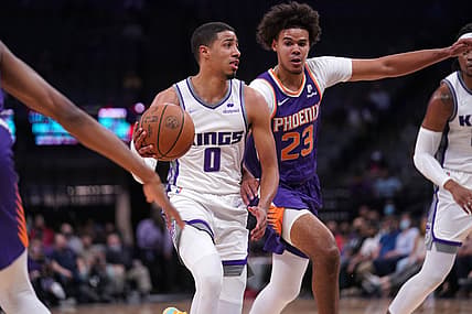 Oct 4, 2021; Sacramento, California, USA; Sacramento Kings guard Tyrese Haliburton (0) drives past Phoenix Suns forward Cameron Johnson (23) in the first quarter at the Golden 1 Center. Mandatory Credit: Cary Edmondson-USA TODAY Sports