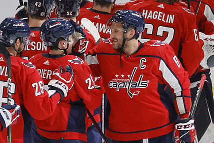 Oct 13, 2021; Washington, District of Columbia, USA; Washington Capitals left wing Alex Ovechkin (8) celebrates with Capitals center Hendrix Lapierre (29) after their game against the New York Rangers at Capital One Arena. Mandatory Credit: Geoff Burke-USA TODAY Sports