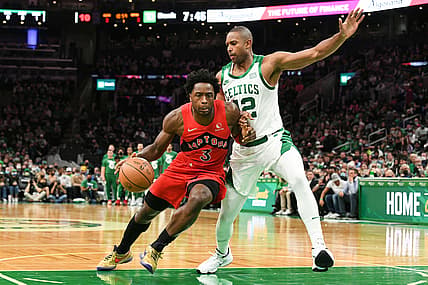 Oct 22, 2021; Boston, Massachusetts, USA; Toronto Raptors forward OG Anunoby (3) drives to the basket against Boston Celtics center Al Horford (42) during the first half at the TD Garden. Mandatory Credit: Brian Fluharty-USA TODAY Sports