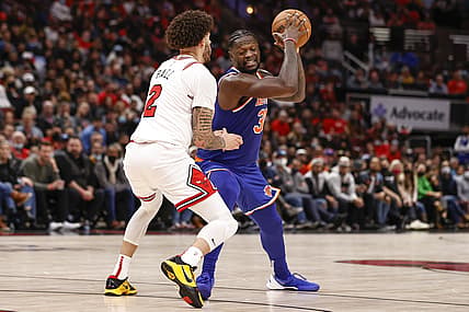 Oct 28, 2021; Chicago, Illinois, USA; Chicago Bulls guard Lonzo Ball (2) defends against New York Knicks forward Julius Randle (30) during the second half at United Center. Mandatory Credit: Kamil Krzaczynski-USA TODAY Sports