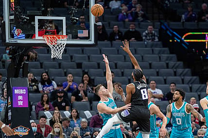 Nov 5, 2021; Sacramento, California, USA; Sacramento Kings forward Maurice Harkless (8) shoots the basketball against Charlotte Hornets forward Gordon Hayward (20) during the first quarter at Golden 1 Center. Mandatory Credit: Neville E. Guard-USA TODAY Sports