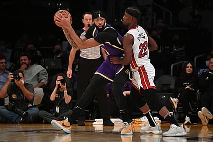 Nov 10, 2021; Los Angeles, California, USA; Los Angeles Lakers forward Anthony Davis (3) moves the ball against Miami Heat forward Jimmy Butler (22) during the first half at Staples Center. Mandatory Credit: Richard Mackson-USA TODAY Sports