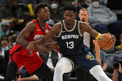 Nov 15, 2021; Memphis, Tennessee, USA; Memphis Grizzles forward Jaren Jackson Jr. (13) drives to the basket as Houston Rockets forward Jae'Sean Tate (8) defends during the first half at FedExForum. Mandatory Credit: Petre Thomas-USA TODAY Sports