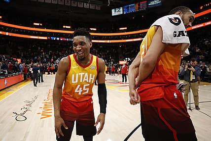 Jan 14, 2019; Salt Lake City, UT, USA; Utah Jazz guard Donovan Mitchell (45) reacts after distracting teammate Rudy Gobert (27) during  a postgame interview after their win against the Detroit Pistons at Vivint Smart Home Arena. Mandatory Credit: Jeff Swinger-USA TODAY Sports