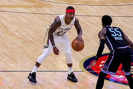 Apr 12, 2021; New Orleans, Louisiana, USA; New Orleans Pelicans guard Isaiah Thomas (24) dribbles against Sacramento Kings guard Delon Wright (55) during the second half at Smoothie King Center. Mandatory Credit: Stephen Lew-USA TODAY Sports