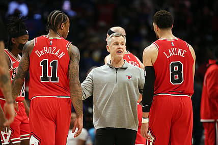 Nov 14, 2021; Los Angeles, California, USA; Chicago Bulls head coach Billy Donovan talks to forward DeMar DeRozan (11) and guard Zach LaVine (8) during a timeout of the NBA game against the Los Angeles Clippers at Staples Center. The Bulls wins 100-90. Mandatory Credit: Kiyoshi Mio-USA TODAY Sports