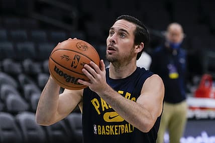 Nov 19, 2021; Charlotte, North Carolina, USA;  Indiana Pacers guard T.J. McConnell (9) during pregame warm ups against the Charlotte Hornets at the Spectrum Center. Mandatory Credit: Jim Dedmon-USA TODAY Sports