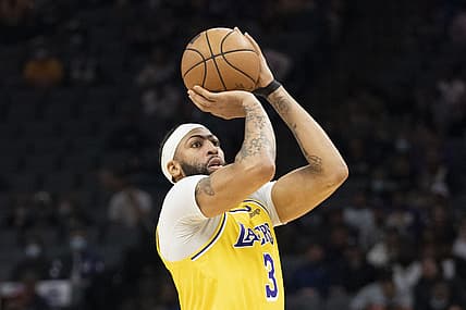 November 30, 2021; Sacramento, California, USA;  Los Angeles Lakers forward Anthony Davis (3) shoots the basketball against the Sacramento Kings during the second quarter at Golden 1 Center. Mandatory Credit: Kyle Terada-USA TODAY Sports