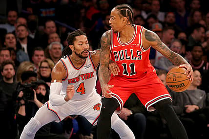 Dec 2, 2021; New York, New York, USA; Chicago Bulls forward DeMar DeRozan (11) controls the ball against New York Knicks guard Derrick Rose (4) during the second quarter at Madison Square Garden. Mandatory Credit: Brad Penner-USA TODAY Sports