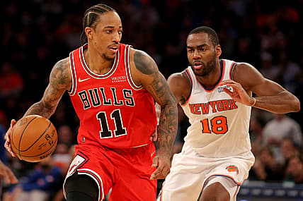 Dec 2, 2021; New York, New York, USA; Chicago Bulls forward DeMar DeRozan (11) controls the ball against New York Knicks guard Alec Burks (18) during the fourth quarter at Madison Square Garden. Mandatory Credit: Brad Penner-USA TODAY Sports