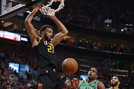 Dec 3, 2021; Salt Lake City, Utah, USA; Utah Jazz center Rudy Gobert (27) dunks the ball to end the second quarter against the Boston Celtics at Vivint Arena. Mandatory Credit: Jeffrey Swinger-USA TODAY Sports