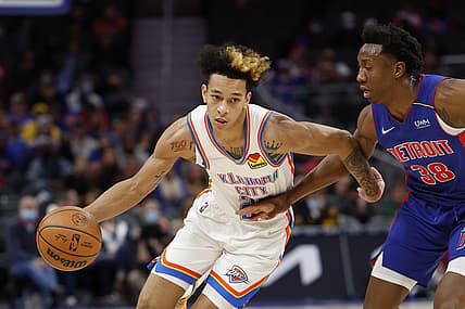 Dec 6, 2021; Detroit, Michigan, USA;  Oklahoma City Thunder guard Shai Gilgeous-Alexander (2) dribbles on Detroit Pistons guard Saben Lee (38) in the first half at Little Caesars Arena. Mandatory Credit: Rick Osentoski-USA TODAY Sports
