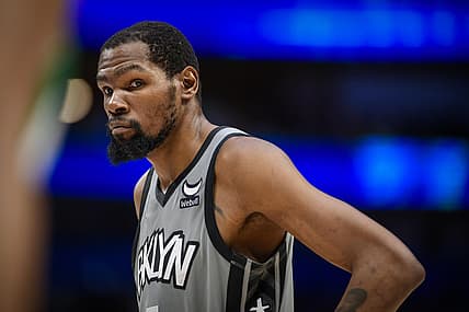 Dec 7, 2021; Dallas, Texas, USA; Brooklyn Nets forward Kevin Durant (7) waits for play to resume against the Dallas Mavericks during the second half at the American Airlines Center. Mandatory Credit: Jerome Miron-USA TODAY Sports