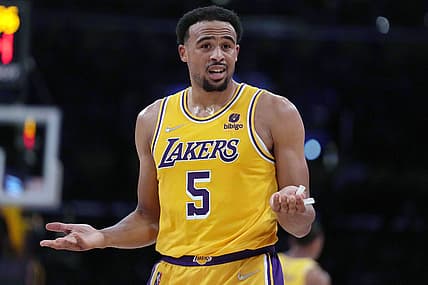 Dec 7, 2021; Los Angeles, California, USA; Los Angeles Lakers guard Talen Horton-Tucker (5) reacts against the Boston Celtics in the first half at Staples Center. Mandatory Credit: Kirby Lee-USA TODAY Sports
