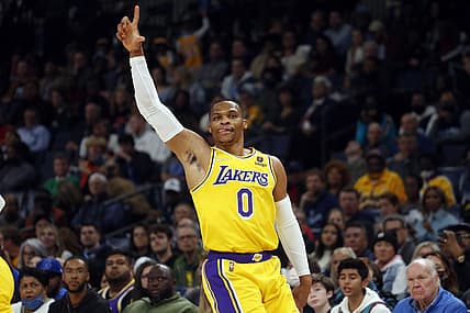 Dec 9, 2021; Memphis, Tennessee, USA; Los Angeles Lakers guard Russell Westbrook (0) reacts after a basket during the first half against the Memphis Grizzles at FedExForum. Mandatory Credit: Petre Thomas-USA TODAY Sports