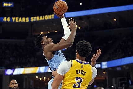 Dec 9, 2021; Memphis, Tennessee, USA; Memphis Grizzles forward Jaren Jackson Jr. (13) shoots over Los Angeles Lakers forward Anthony Davis (3) during the second half at FedExForum. Mandatory Credit: Petre Thomas-USA TODAY Sports