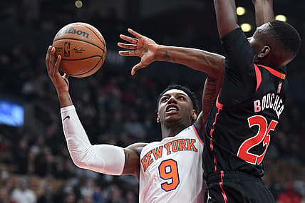 Dec 10, 2021; Toronto, Ontario, CAN;  New York Knicks forward RJ Barrett (9) shoots the ball against Toronto Raptors forward Chris Boucher (25) in the first half at Scotiabank Arena. Mandatory Credit: Dan Hamilton-USA TODAY Sports