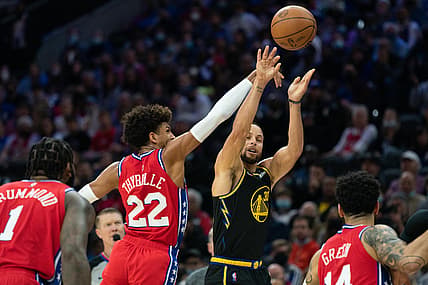 Dec 11, 2021; Philadelphia, Pennsylvania, USA; Philadelphia 76ers guard Matisse Thybulle (22) blocks the shot attempt of Golden State Warriors guard Stephen Curry (30) during the second quarter at Wells Fargo Center. Mandatory Credit: Bill Streicher-USA TODAY Sports