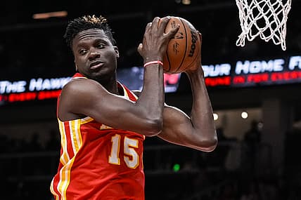 Dec 13, 2021; Atlanta, Georgia, USA; Atlanta Hawks center Clint Capela (15) gets a rebound against the Houston Rockets during the first half at State Farm Arena. Mandatory Credit: Dale Zanine-USA TODAY Sports