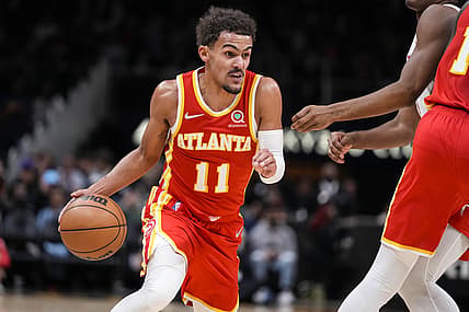 Dec 13, 2021; Atlanta, Georgia, USA; Atlanta Hawks guard Trae Young (11) dribbles against the Houston Rockets during the second half at State Farm Arena. Mandatory Credit: Dale Zanine-USA TODAY Sports