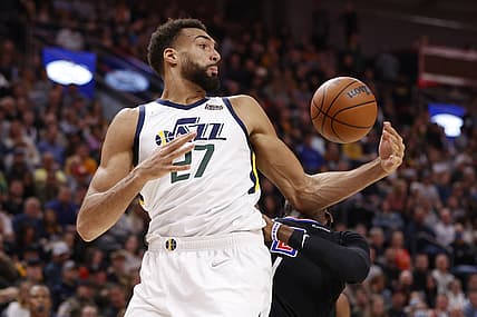 Dec 15, 2021; Salt Lake City, Utah, USA; Utah Jazz center Rudy Gobert (27) grabs a rebound against LA Clippers guard Reggie Jackson (1) in the first quarter at Vivint Arena. Mandatory Credit: Jeffrey Swinger-USA TODAY Sports