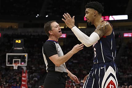Dec 16, 2021; Houston, Texas, USA; Houston Rockets forward Kenyon Martin Jr. (6) argues a call with Crew Chief official Ben Taylor as the Rockets play against the New York Knicks  in the third quarter at Toyota Center. Mandatory Credit: Thomas Shea-USA TODAY Sports