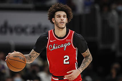 Dec 19, 2021; Chicago, Illinois, USA; Chicago Bulls guard Lonzo Ball (2) brings the ball up court against the Los Angeles Lakers during the first half at United Center. Mandatory Credit: Kamil Krzaczynski-USA TODAY Sports