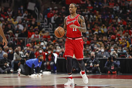 Dec 19, 2021; Chicago, Illinois, USA; Chicago Bulls forward DeMar DeRozan (11) brings the ball up court against the Los Angeles Lakers during the first half at United Center. Mandatory Credit: Kamil Krzaczynski-USA TODAY Sports
