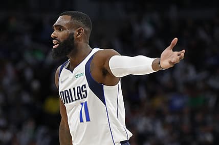 Dec 19, 2021; Minneapolis, Minnesota, USA; Dallas Mavericks guard Tim Hardaway Jr. (11) questions a referee about a call with the Minnesota Timberwolves in the third quarter at Target Center. Mandatory Credit: Bruce Kluckhohn-USA TODAY Sports