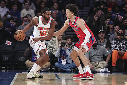 Dec 21, 2021; New York, New York, USA;  New York Knicks guard Alec Burks (18) is guarded by Detroit Pistons guard Cade Cunningham (2) in the first quarter at Madison Square Garden. Mandatory Credit: Wendell Cruz-USA TODAY Sports