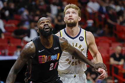Dec 21, 2021; Miami, Florida, USA; Miami Heat center Dewayne Dedmon (21) guard Indiana Pacers forward Domantas Sabonis (11) during the first half  at FTX Arena. Mandatory Credit: Sam Navarro-USA TODAY Sports