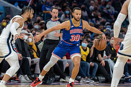 Dec 23, 2021; San Francisco, California, USA;  Golden State Warriors guard Stephen Curry (30) dribbles the basketball during the second quarter against Memphis Grizzlies forward Dillon Brooks (24) at Chase Center. Mandatory Credit: Neville E. Guard-USA TODAY Sports