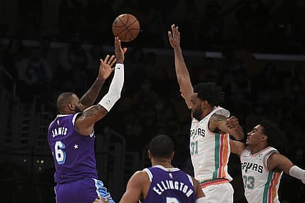 Dec 23, 2021; Los Angeles, California, USA;  Los Angeles Lakers forward Lebron James (6) shoots the ball against San Antonio Spurs forward Keita Bates-Diop (31) during the second quarter at Staples Center. Mandatory Credit: Richard Mackson-USA TODAY Sports