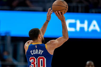 Dec 23, 2021; San Francisco, California, USA; Golden State Warriors guard Stephen Curry (30) shoots a three-point basket during the third quarter against the Memphis Grizzlies at Chase Center. Mandatory Credit: Neville E. Guard-USA TODAY Sports