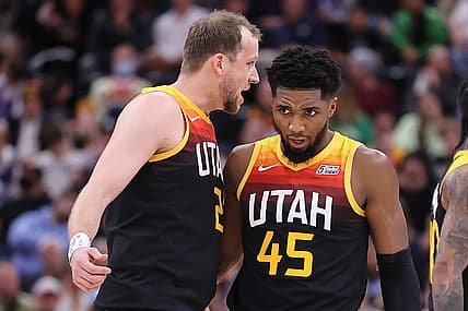 Dec 25, 2021; Salt Lake City, Utah, USA; Utah Jazz guard Joe Ingles (2) and guard Donovan Mitchell (45) speak during a break in action in the second quarter against the Dallas Mavericks at Vivint Arena. Mandatory Credit: Rob Gray-USA TODAY Sports