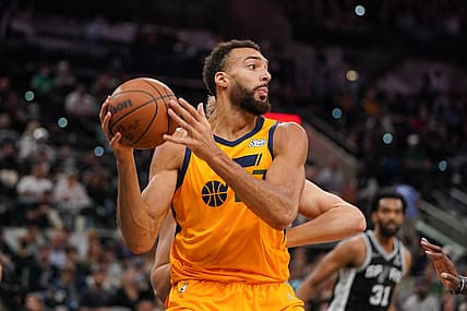 Dec 27, 2021; San Antonio, Texas, USA;  Utah Jazz center Rudy Gobert (27) looks to pass in the first half against the San Antonio Spurs at the AT&T Center. Mandatory Credit: Daniel Dunn-USA TODAY Sports
