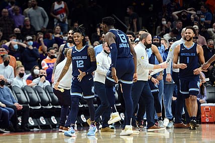 Dec 27, 2021; Phoenix, Arizona, USA; Memphis Grizzlies guard Ja Morant (12) reacts after hitting a game winning shot against the Phoenix Suns during the second half at Footprint Center. Mandatory Credit: Joe Camporeale-USA TODAY Sports