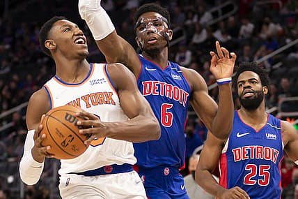 Dec 29, 2021; Detroit, Michigan, USA; New York Knicks guard RJ Barrett (9) goes up for a shot against Detroit Pistons guard Hamidou Diallo (6) during the first quarter at Little Caesars Arena. Mandatory Credit: Raj Mehta-USA TODAY Sports