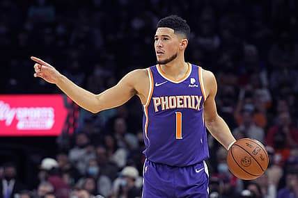 Dec 29, 2021; Phoenix, Arizona, USA; Phoenix Suns guard Devin Booker (1) yells out the play against the Oklahoma City Thunder in the first half at Footprint Center. Mandatory Credit: Rick Scuteri-USA TODAY Sports