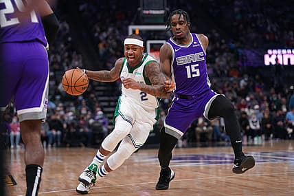 Dec 29, 2021; Sacramento, California, USA; Dallas Mavericks guard Isaiah Thomas (2) moves the ball against Sacramento Kings guard Davion Mitchell (15) in the first quarter at the Golden 1 Center. Mandatory Credit: Cary Edmondson-USA TODAY Sports