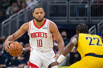 Dec 23, 2021; Indianapolis, Indiana, USA; Houston Rockets guard Eric Gordon (10) dribbles the ball while Indiana Pacers guard Caris LeVert (22) defends in the first quarter at Gainbridge Fieldhouse. Mandatory Credit: Trevor Ruszkowski-USA TODAY Sports