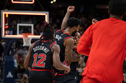 Dec 31, 2021; Indianapolis, Indiana, USA; Chicago Bulls forward DeMar DeRozan (11) celebrates his game winning basket with teammates as time expires against the Indiana Pacers at Gainbridge Fieldhouse. Mandatory Credit: Trevor Ruszkowski-USA TODAY Sports