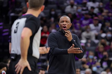 Dec 31, 2021; Sacramento, California, USA; Sacramento Kings interim head coach Alvin Gentry argues a call with referee Nick Buchert (3) during the third quarter against the Dallas Mavericks at Golden 1 Center. Mandatory Credit: Sergio Estrada-USA TODAY Sports