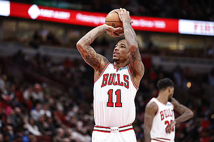 Jan 3, 2022; Chicago, Illinois, USA; Chicago Bulls forward DeMar DeRozan (11) shoots a free throw against the Orlando Magic during the second half at United Center. Mandatory Credit: Kamil Krzaczynski-USA TODAY Sports