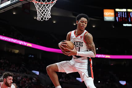 Jan 3, 2022; Portland, Oregon, USA;  Portland Trail Blazers guard Anfernee Simons (1) grabs a rebound in the closing seconds of the second half against the Atlanta Hawks at Moda Center. Mandatory Credit: Jaime Valdez-USA TODAY Sports