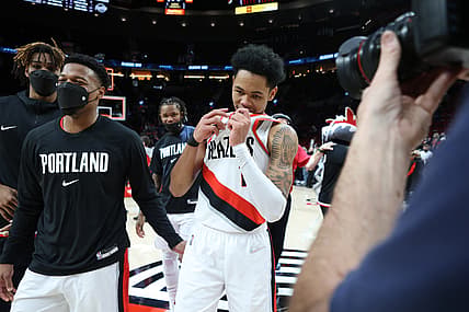 Jan 3, 2022; Portland, Oregon, USA; Portland Trail Blazers guard Anfernee Simons (1) reacts after scoring 43 points in Portland's 136-131 win over Atlanta Hawks at Moda Center. Mandatory Credit: Jaime Valdez-USA TODAY Sports