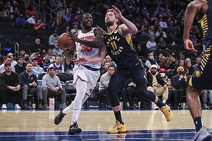 Jan 4, 2022; New York, New York, USA;  New York Knicks forward Julius Randle (30) drives past Indiana Pacers forward Domantas Sabonis (11) in the third quarter at Madison Square Garden. Mandatory Credit: Wendell Cruz-USA TODAY Sports