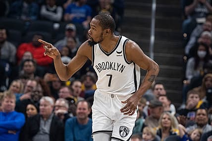 Jan 5, 2022; Indianapolis, Indiana, USA; Brooklyn Nets forward Kevin Durant (7) reacts to a made basket in the first quarter against the Indiana Pacers at Gainbridge Fieldhouse. Mandatory Credit: Trevor Ruszkowski-USA TODAY Sports