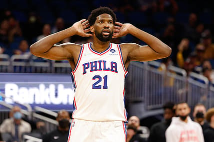 Jan 5, 2022; Orlando, Florida, USA;  Philadelphia 76ers center Joel Embiid (21) reacts to chants of MVP from the crowd in the fourth quarter against the Orlando Magic at Amway Center. Mandatory Credit: Nathan Ray Seebeck-USA TODAY Sports